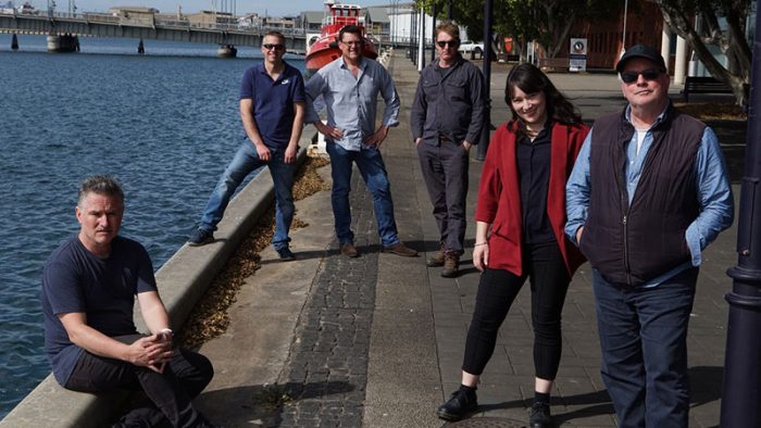 The team from 57 Films on location in Port Adelaide for SAFC supported documentary feature This is Port Adelaide currently streaming on Stan. L-R: Isaac Walgos, Matt Gierke, James Moody, Will Sheridan, Nicole Miller and Paul Ryan, image supplied.