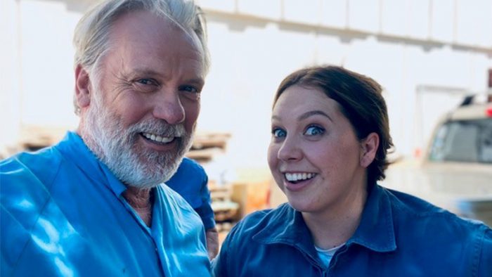 Erik Thomson and Natalie Abbott both wear blue shirts and take a selfie on set for Aftertaste S2, image credit Erik Thomson