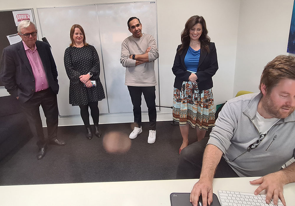 SAFC Board Chair Mike Rann, SAFC CEO Kate Croser, producer Eddie Betts and SA Arts Minister Andrea Michaels watching some early cuts of Eddie's Lil' Homies  with co-director Luke Jurevicus in the Adelaide Studios production offices