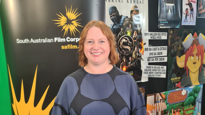 SAFC CEO Kate Croser in front of the SAFC booth at the 2023 Student Pathways and Careers Expo.