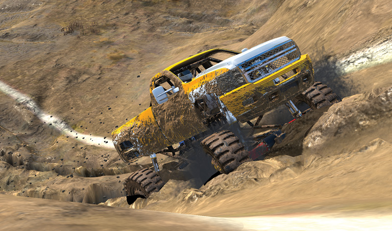 A yellow truck driving uphill through mud.