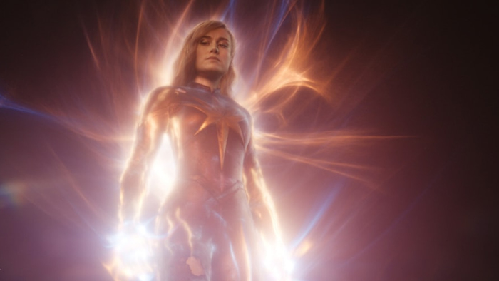 Mrs Marvel in a power stance, her fists glowing.