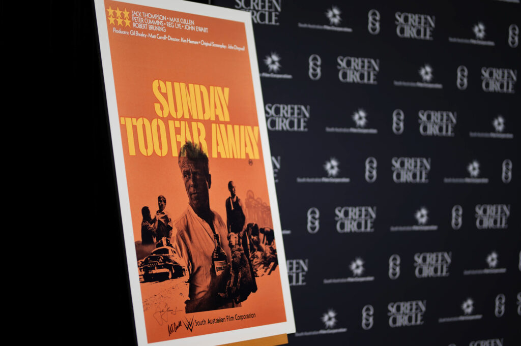 Sunday Too Far Away poster on display.